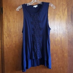 Blue tank top. Never worn.